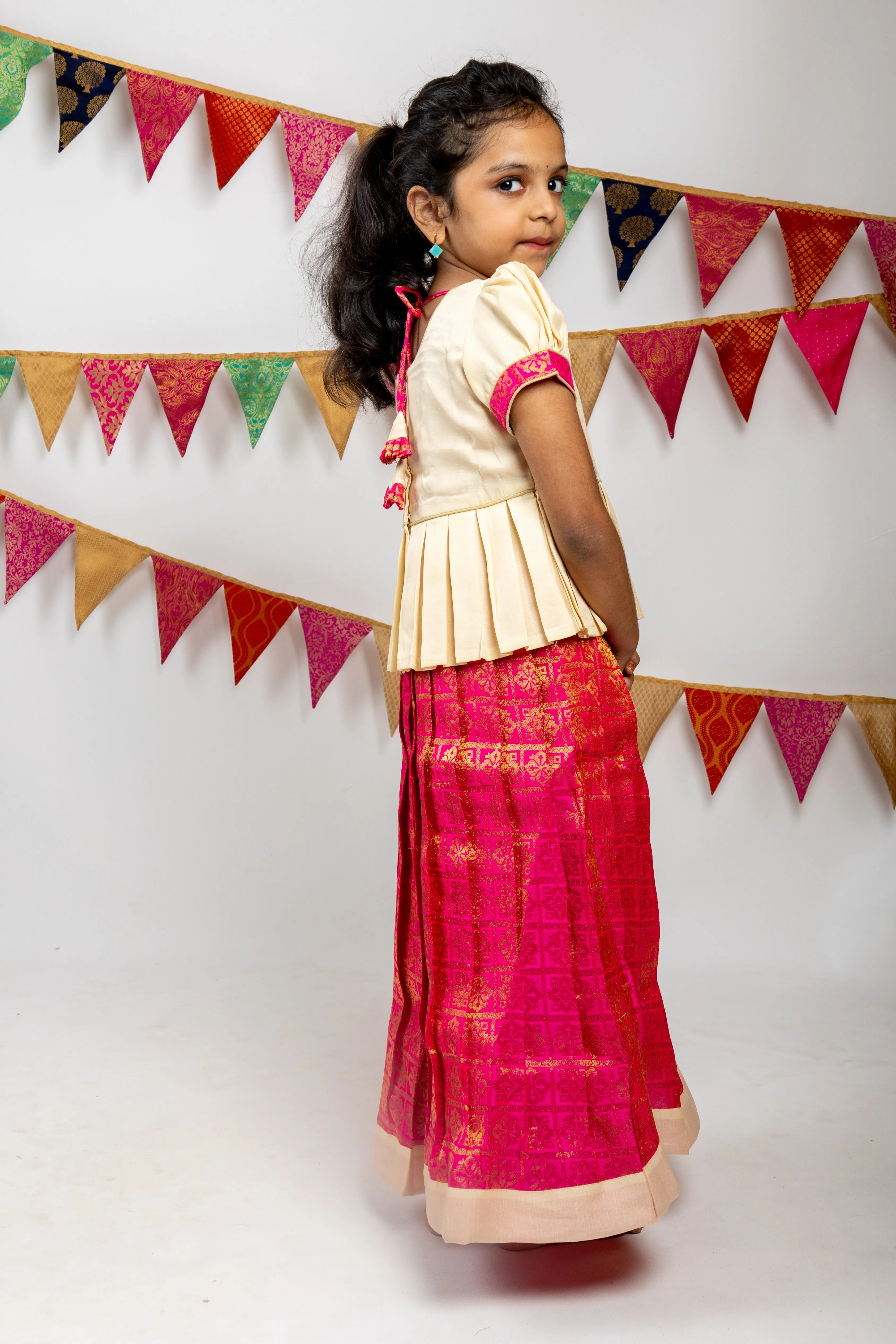 Deep Magenta Pink Semi Kanchi Jacquard Silk Pattu Pavada With Contrasting Peplum Blouse