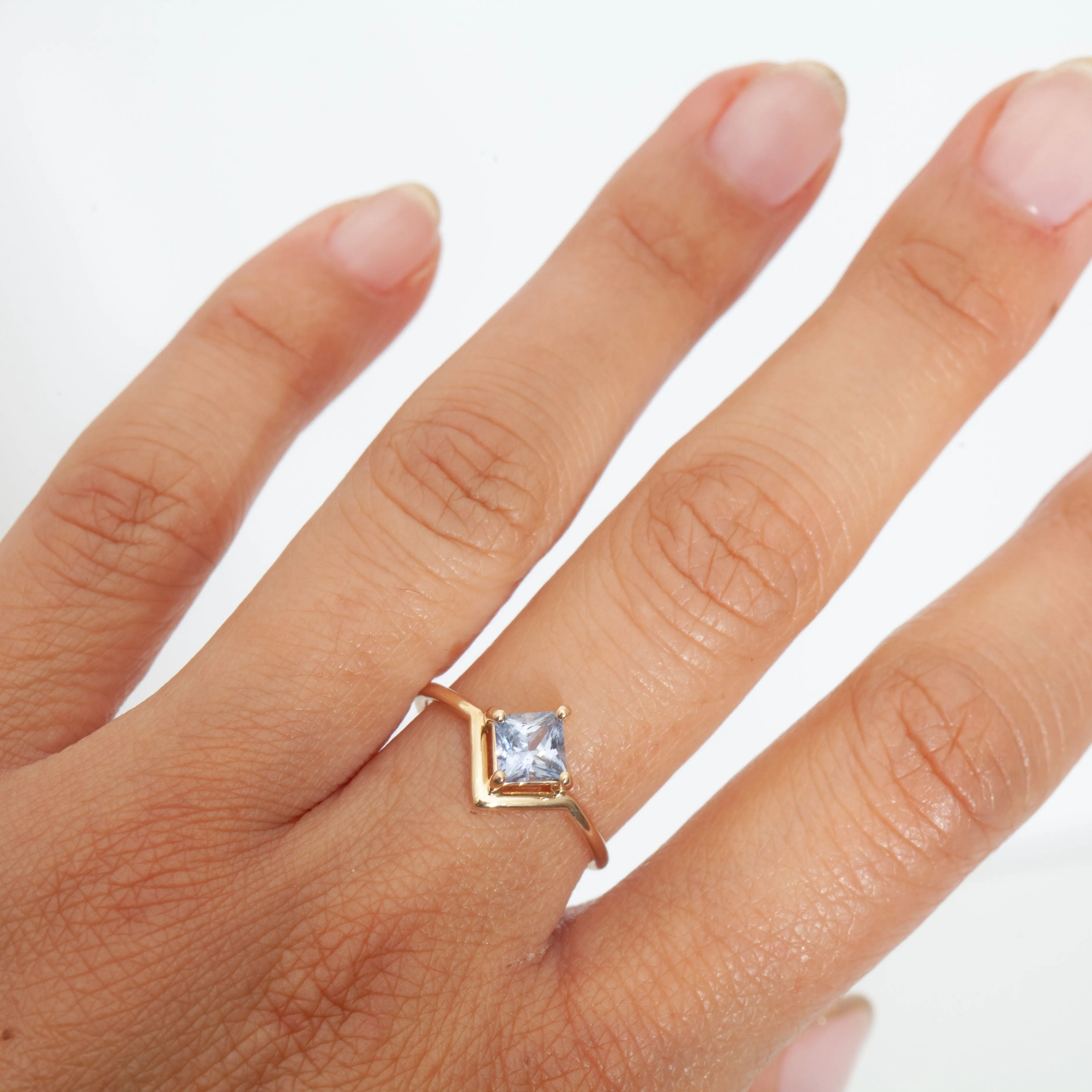 Nestled Princess Cut Sapphire Ring