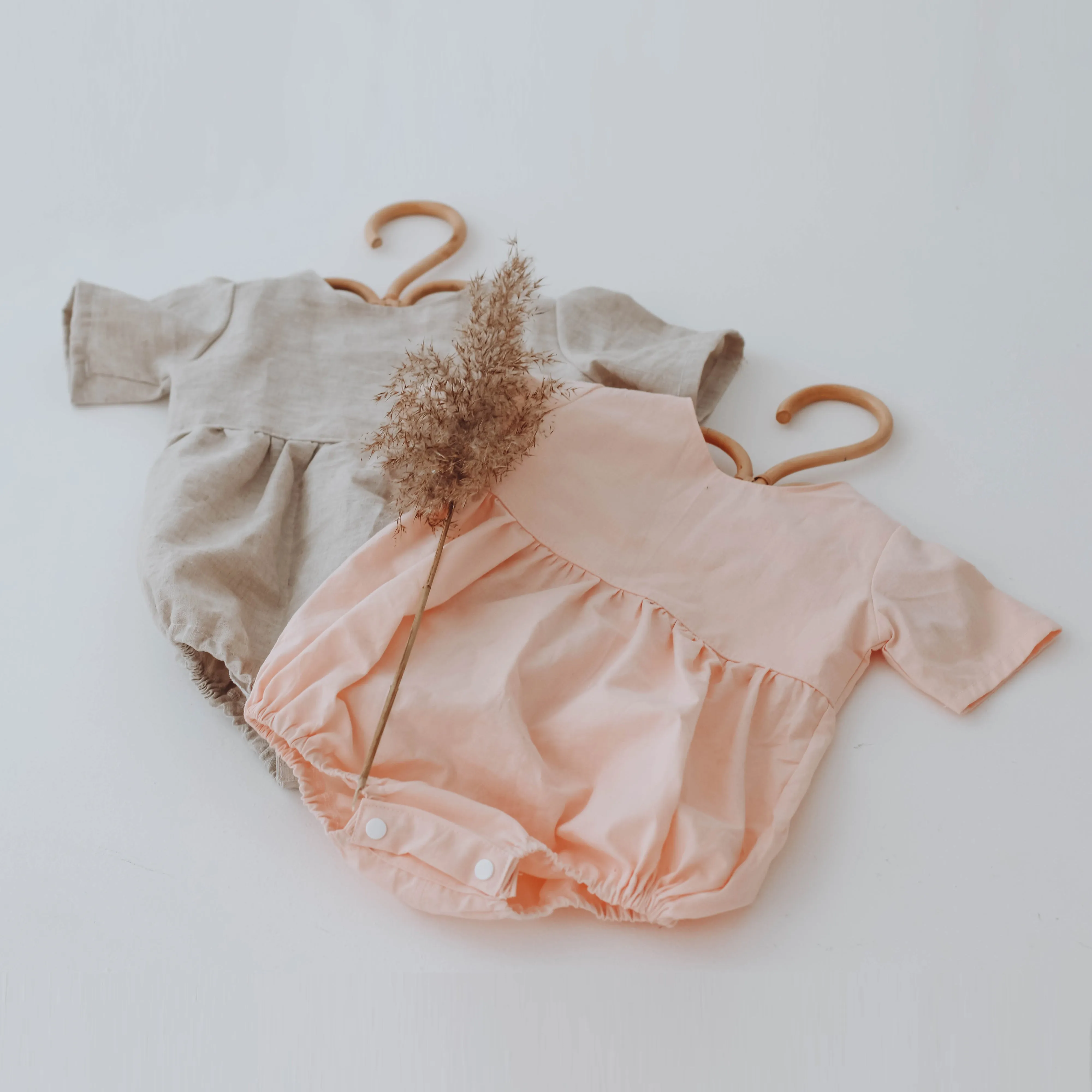 Peach romper with short sleeves