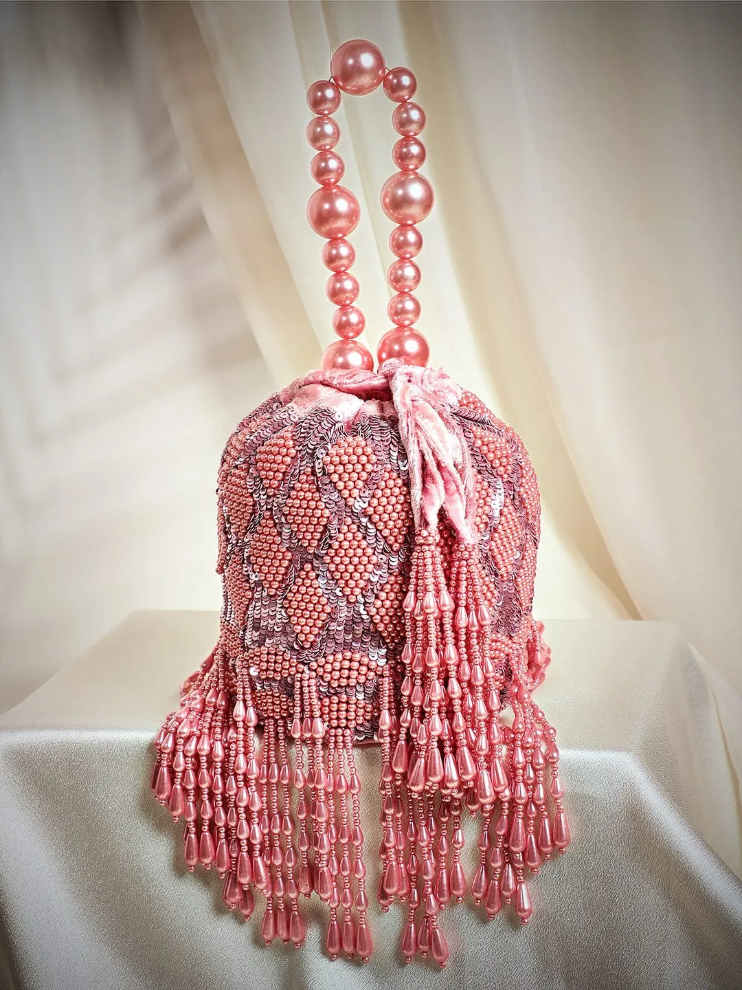 Rubans Peach Coloured Potli Bag Embellished With Peach Beads