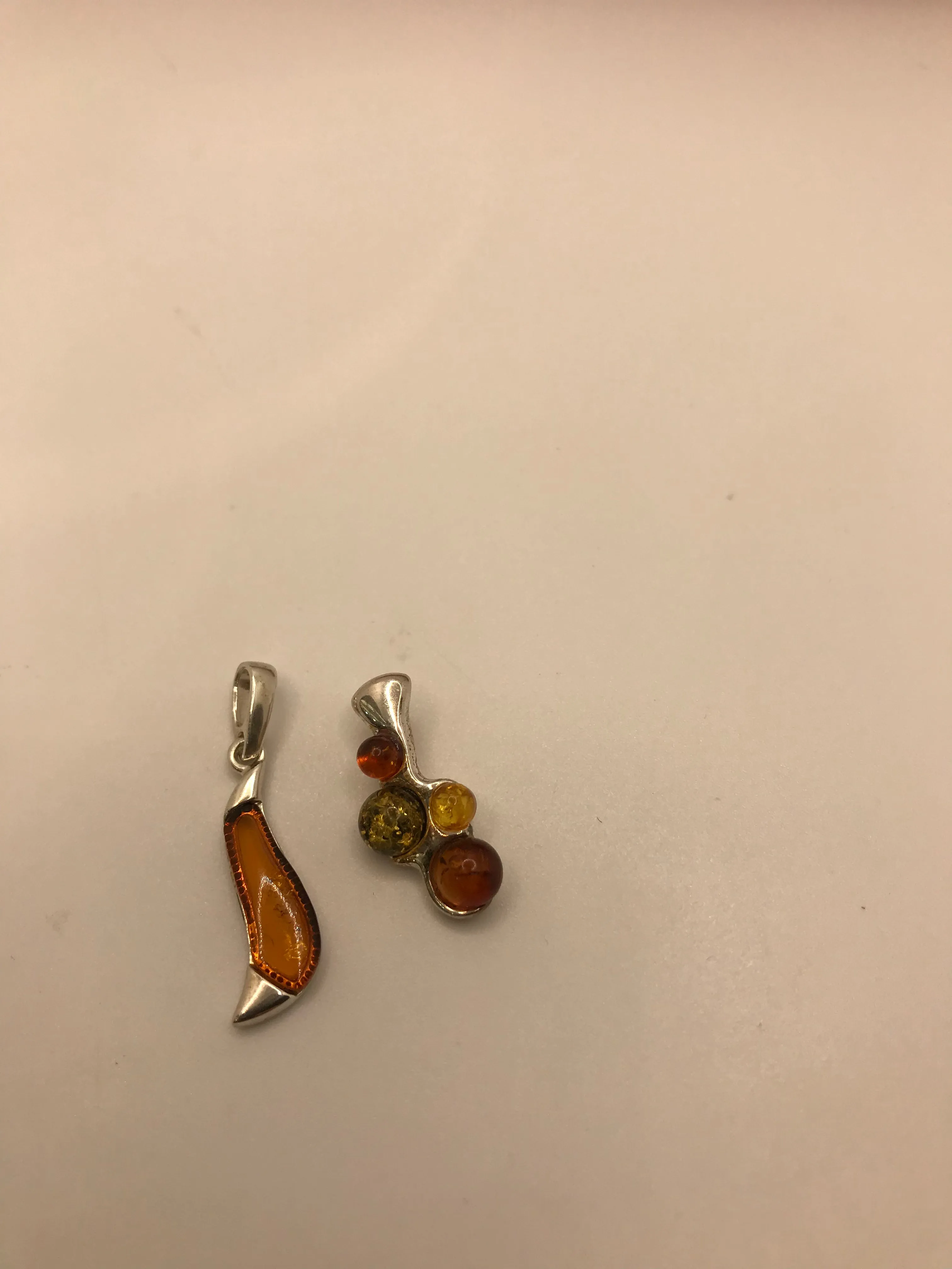 Sterling silver amber pendants